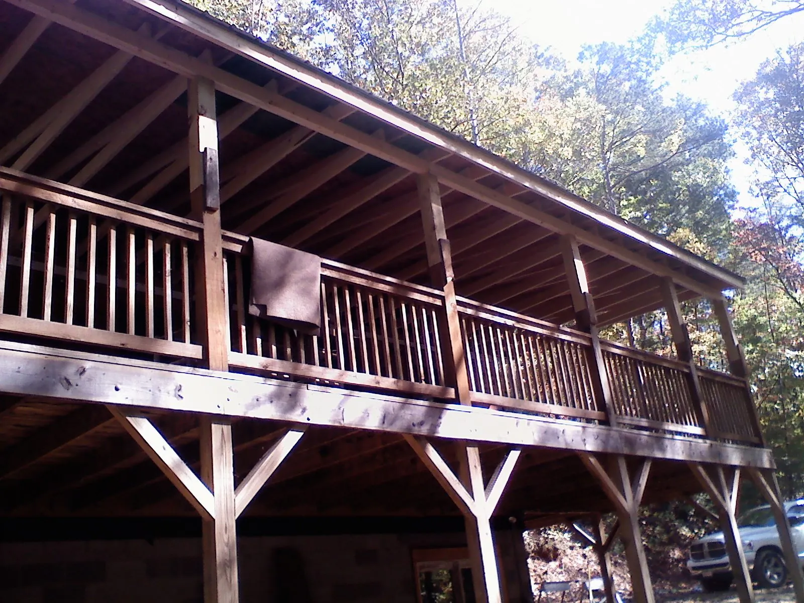 Timber framing under a new elevated porch and deck — Roof Leak Repair in Scappoose by Roofing Brothers